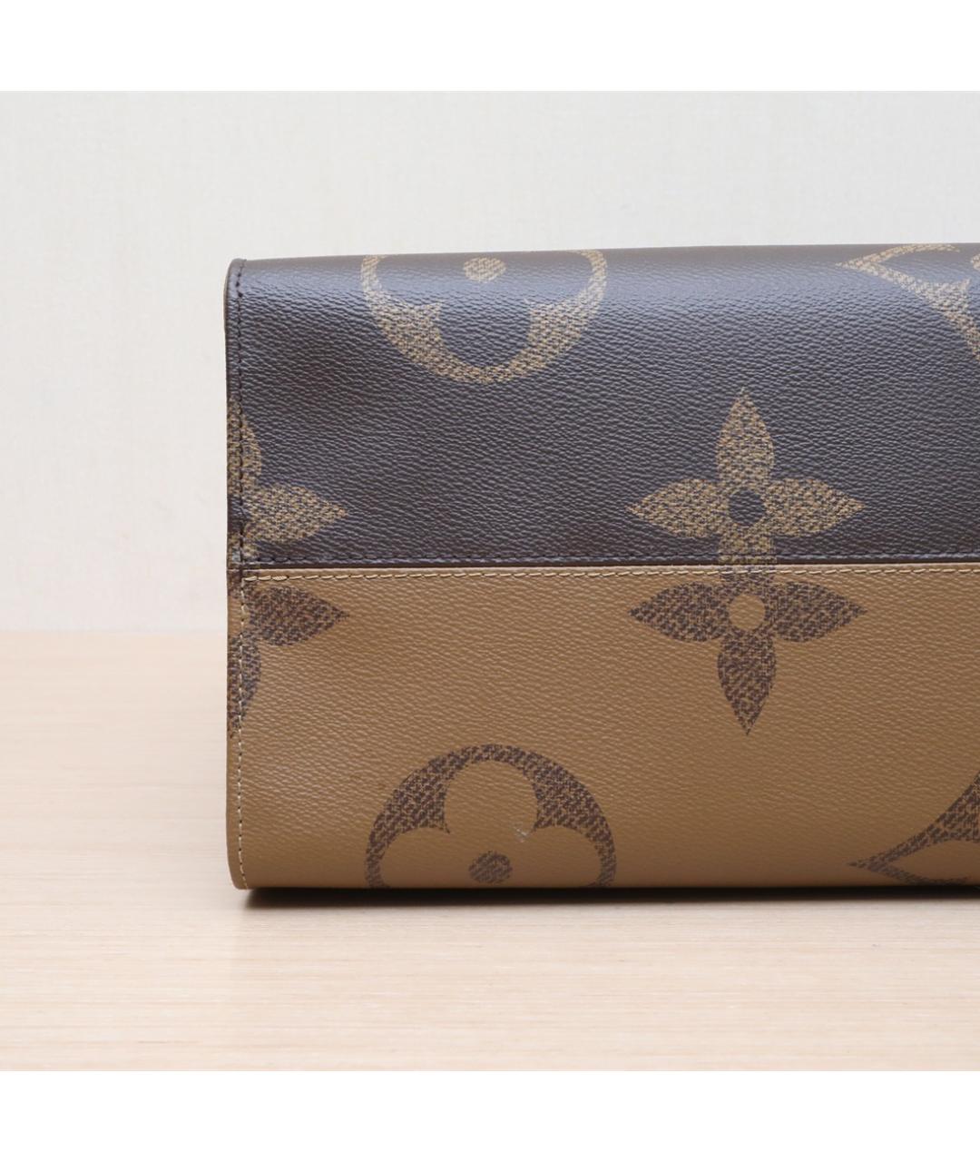 LOUIS VUITTON Коричневая кожаная сумка тоут, фото 9