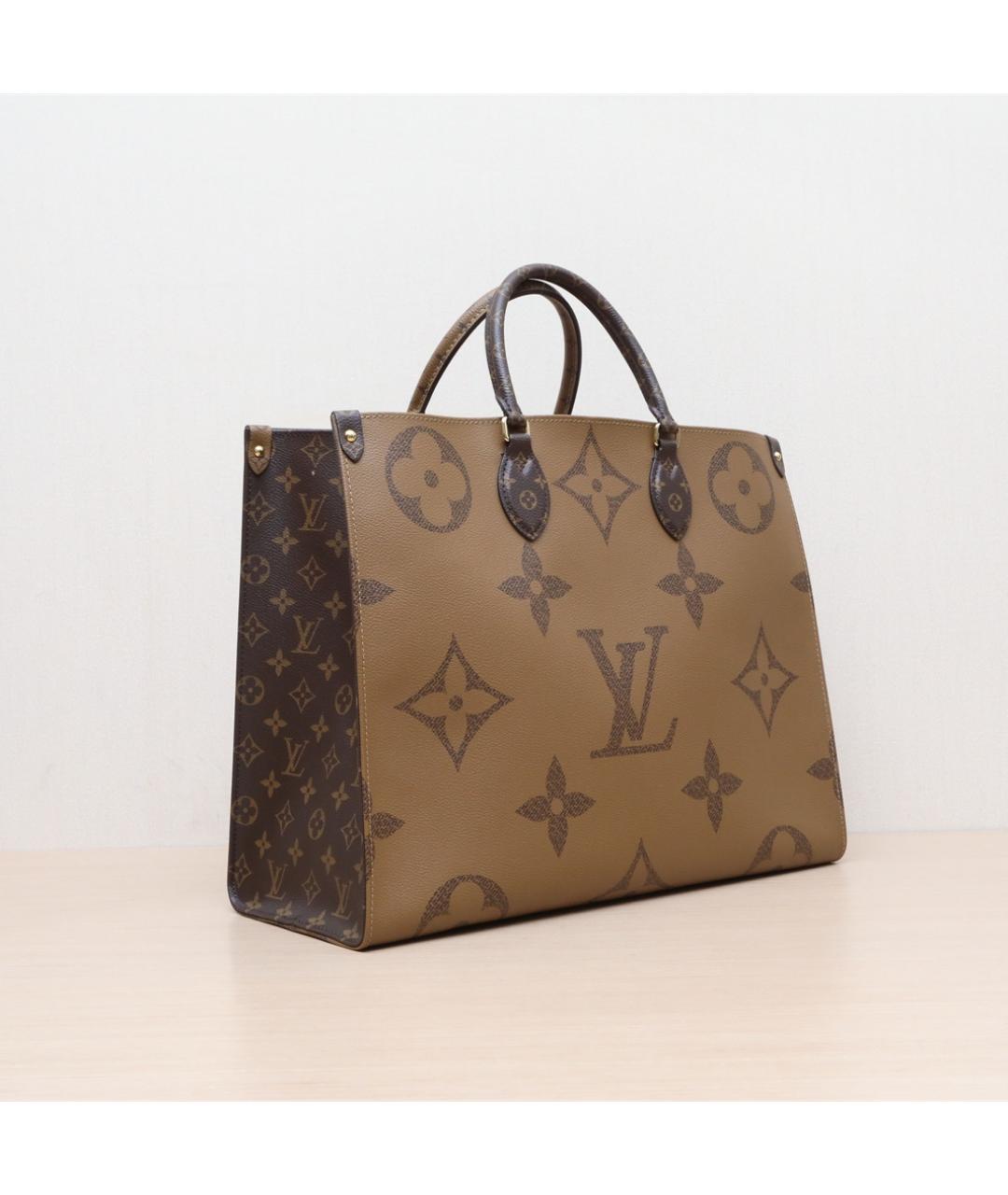 LOUIS VUITTON Коричневая кожаная сумка тоут, фото 6