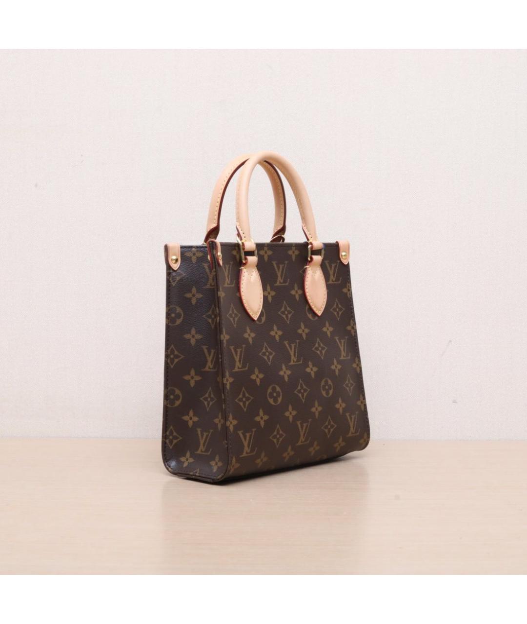 LOUIS VUITTON Коричневая кожаная сумка через плечо, фото 6
