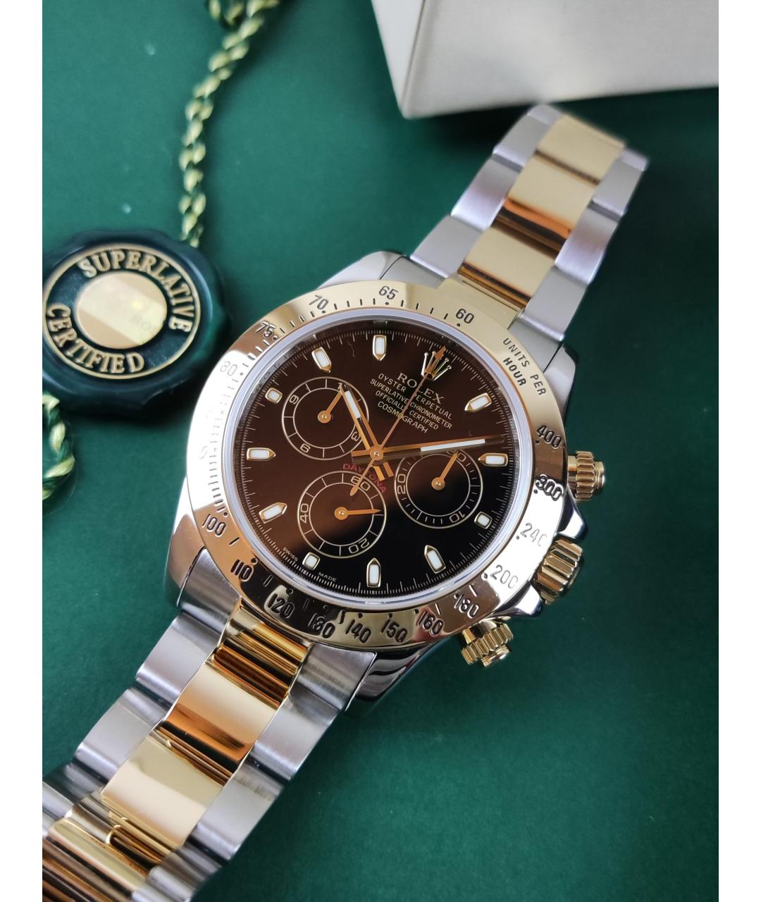 ROLEX Черные часы из желтого золота, фото 2