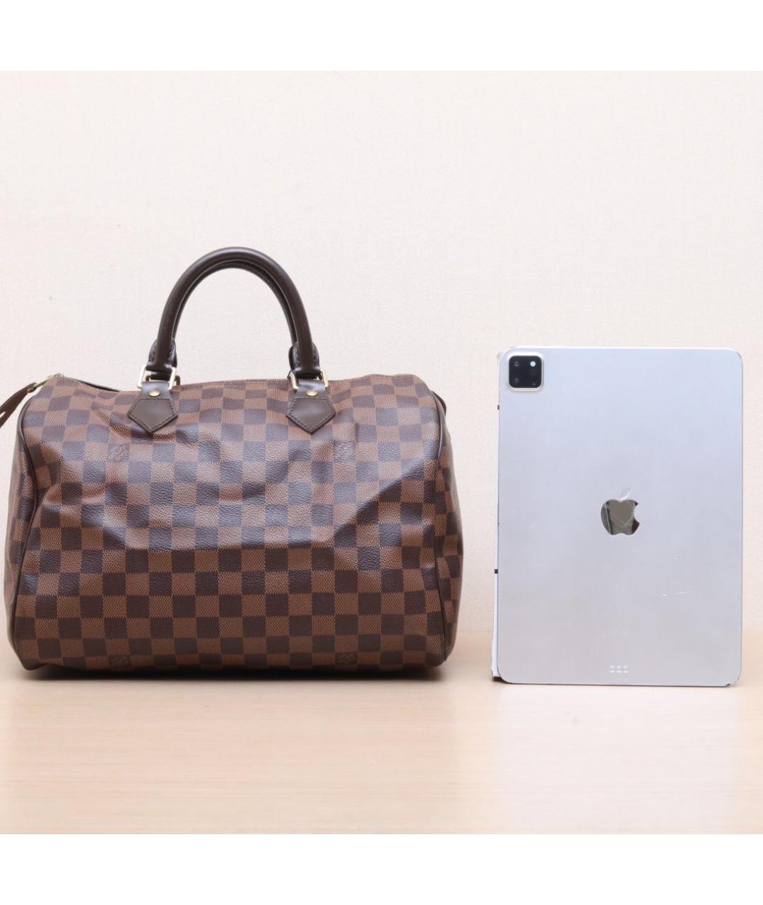 LOUIS VUITTON Коричневая кожаная сумка тоут, фото 7