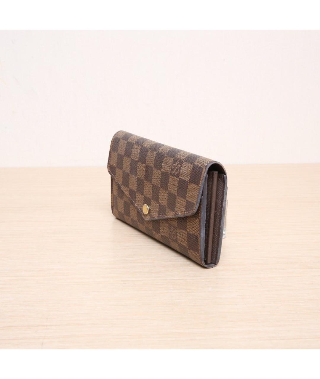 LOUIS VUITTON Коричневый кожаный кошелек, фото 4