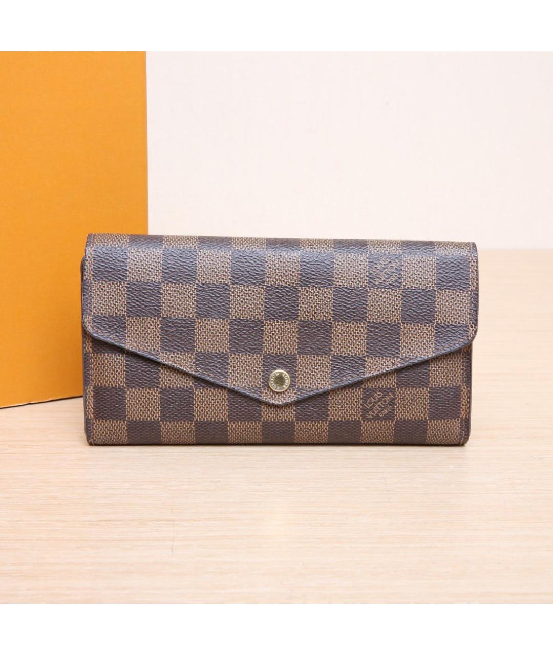 LOUIS VUITTON Коричневый кожаный кошелек, фото 2