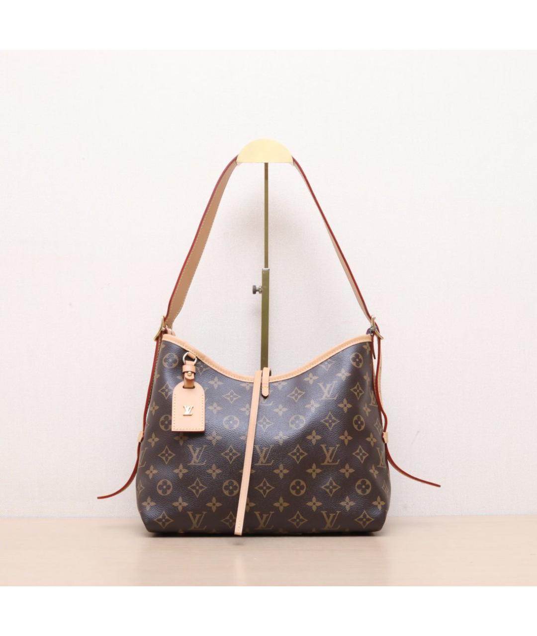 LOUIS VUITTON Коричневая кожаная сумка через плечо, фото 3