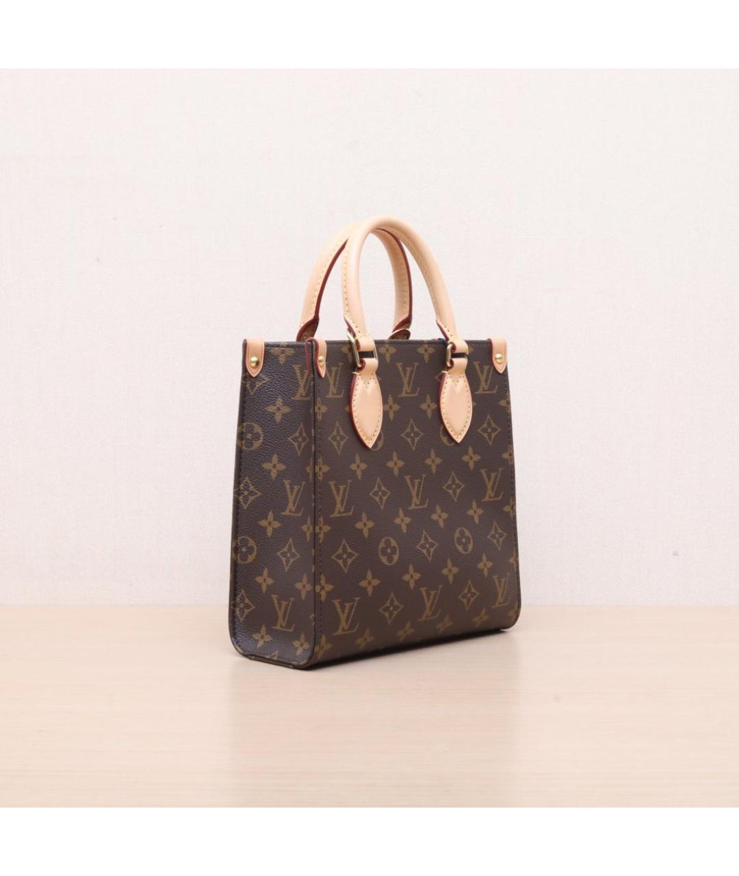 LOUIS VUITTON Коричневая кожаная сумка через плечо, фото 6