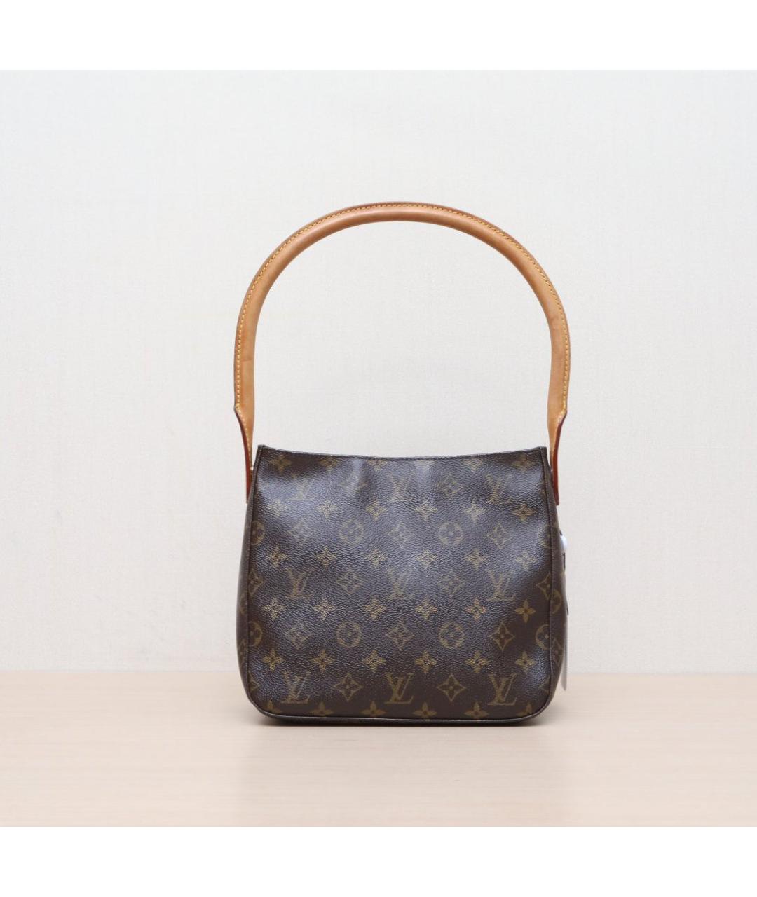 LOUIS VUITTON Коричневая кожаная сумка тоут, фото 3