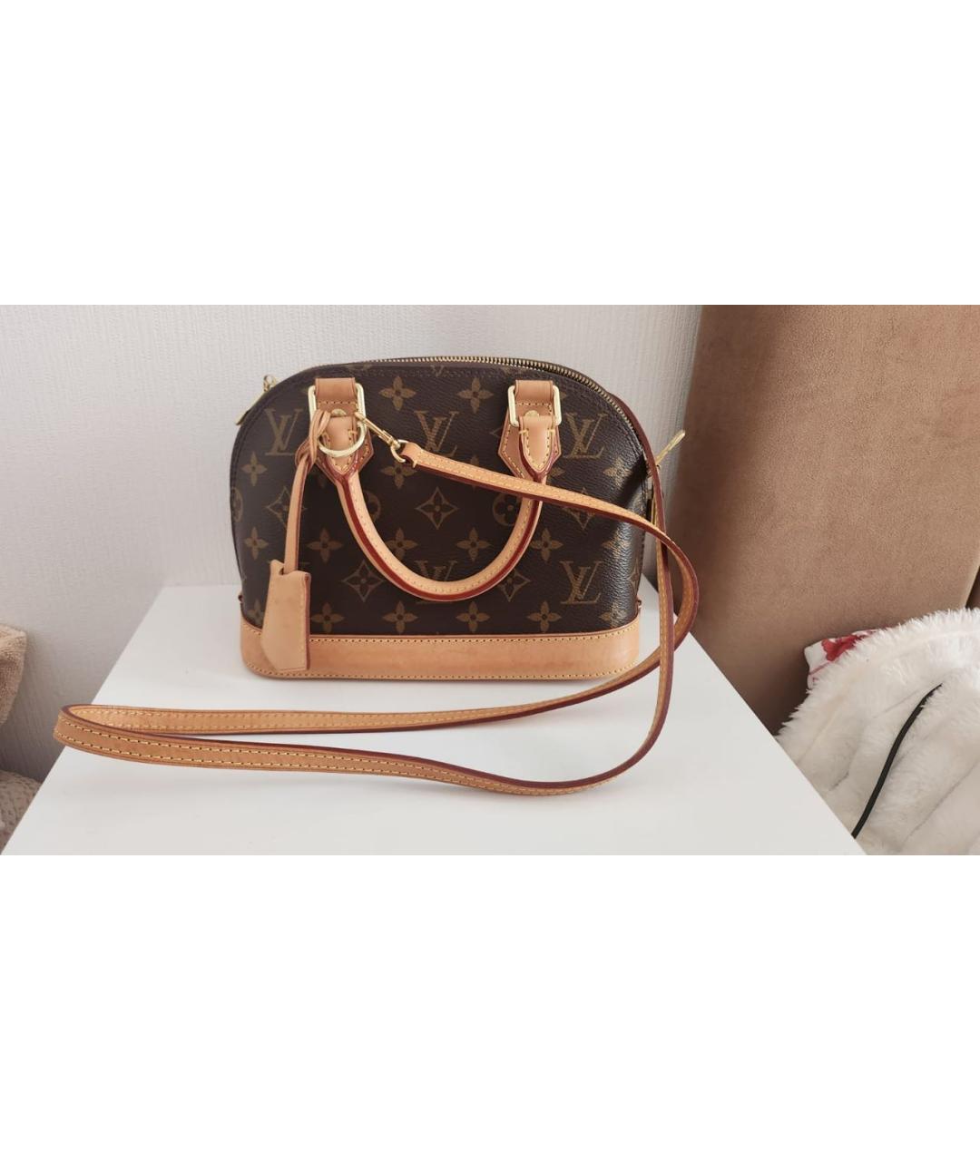 LOUIS VUITTON Коричневая кожаная сумка тоут, фото 9