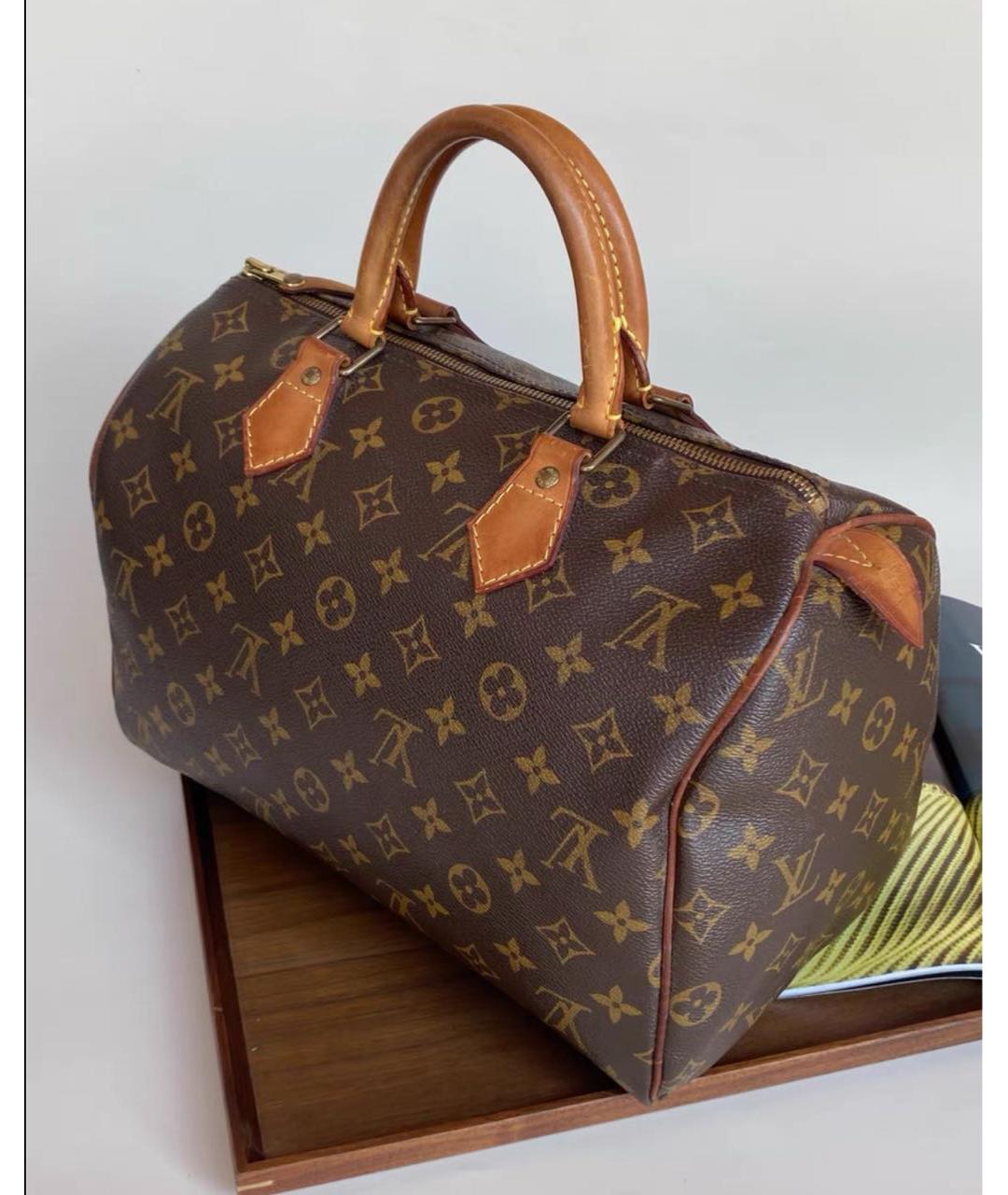 LOUIS VUITTON Коричневая кожаная сумка с короткими ручками, фото 5