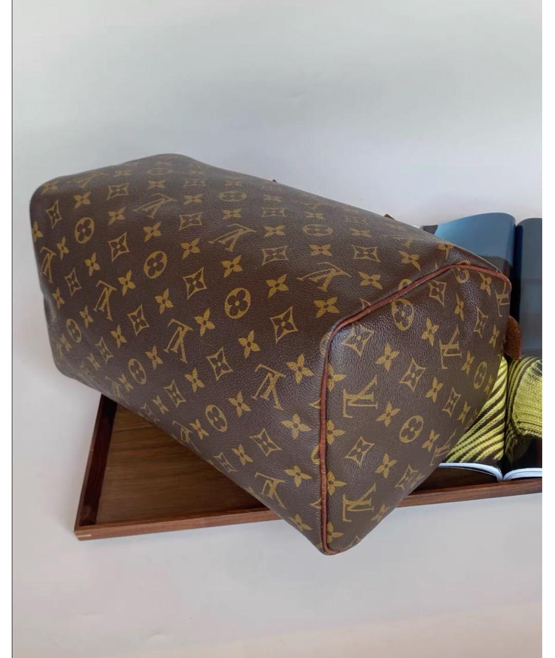LOUIS VUITTON Коричневая кожаная сумка с короткими ручками, фото 4