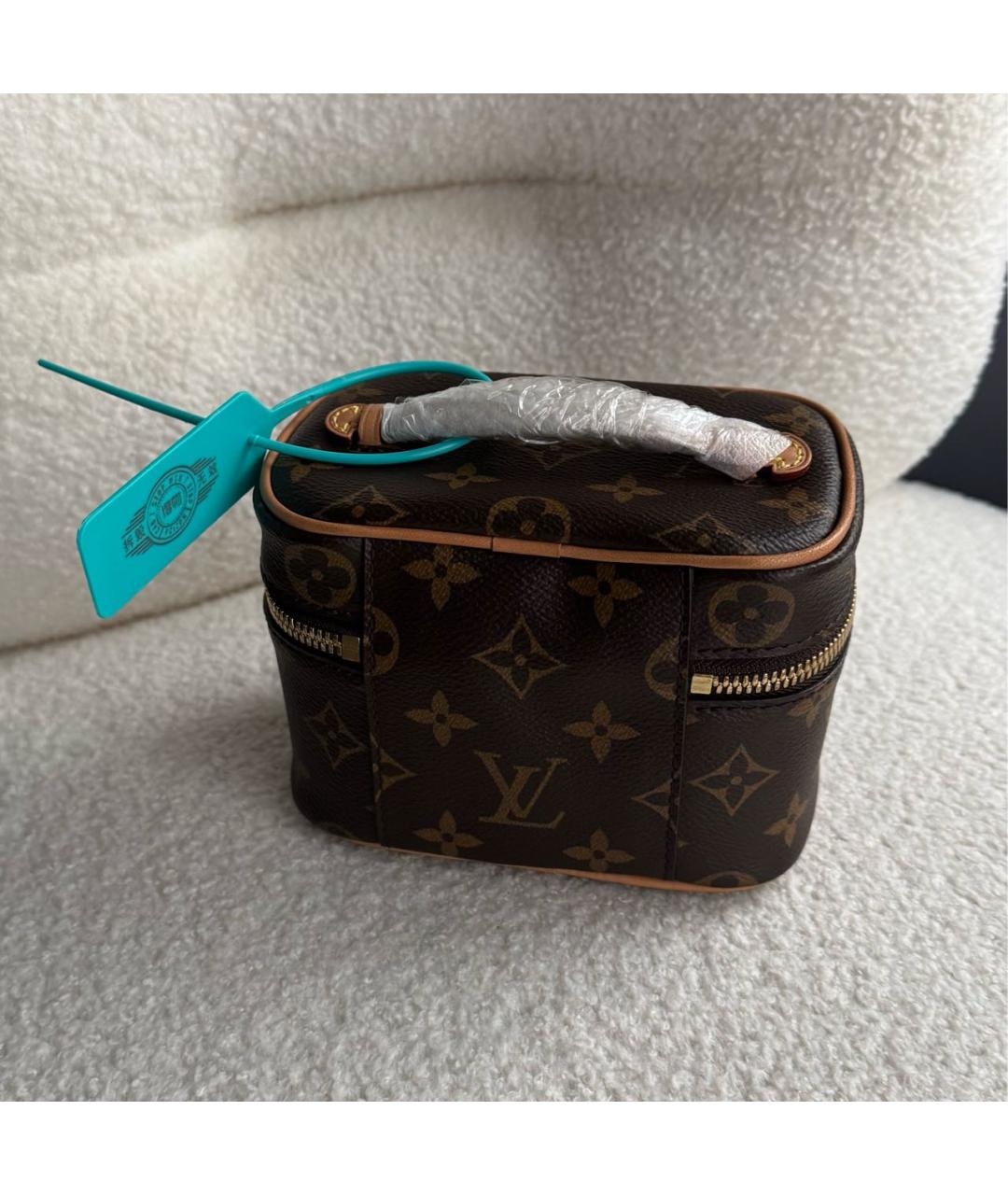 LOUIS VUITTON Коричневая кожаная косметичка, фото 3