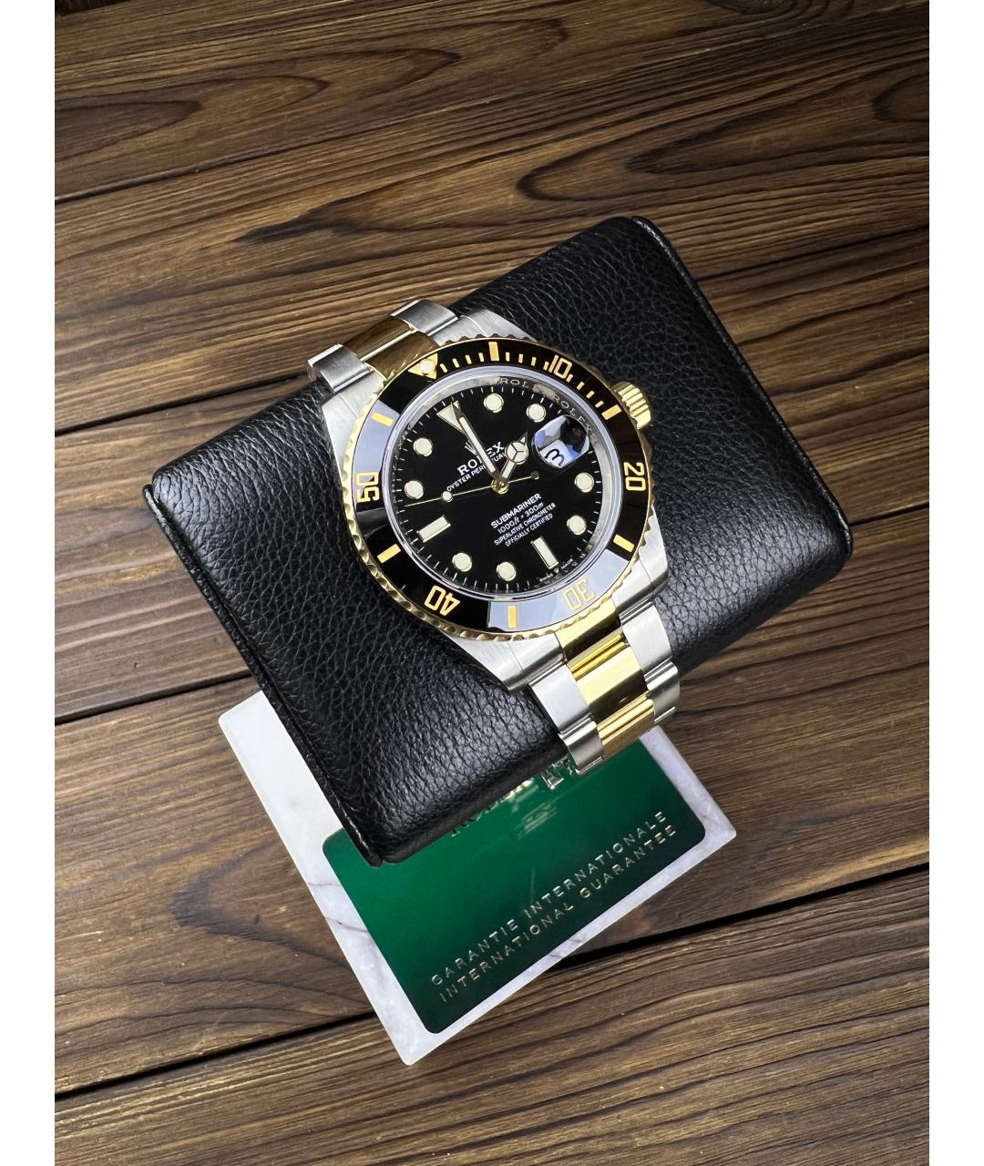 ROLEX Черные часы из желтого золота, фото 2