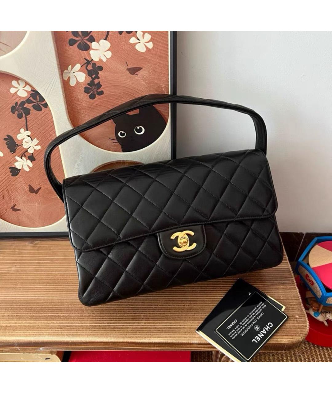 CHANEL Черная кожаная сумка с короткими ручками, фото 7