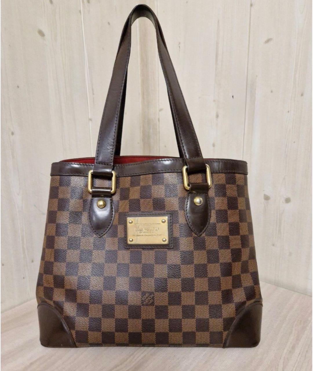 LOUIS VUITTON Коричневая кожаная сумка тоут, фото 9