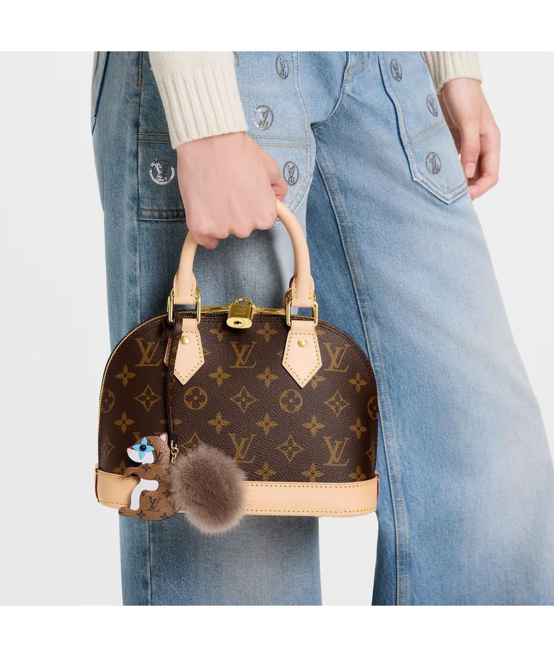 LOUIS VUITTON Коричневый брелок, фото 3