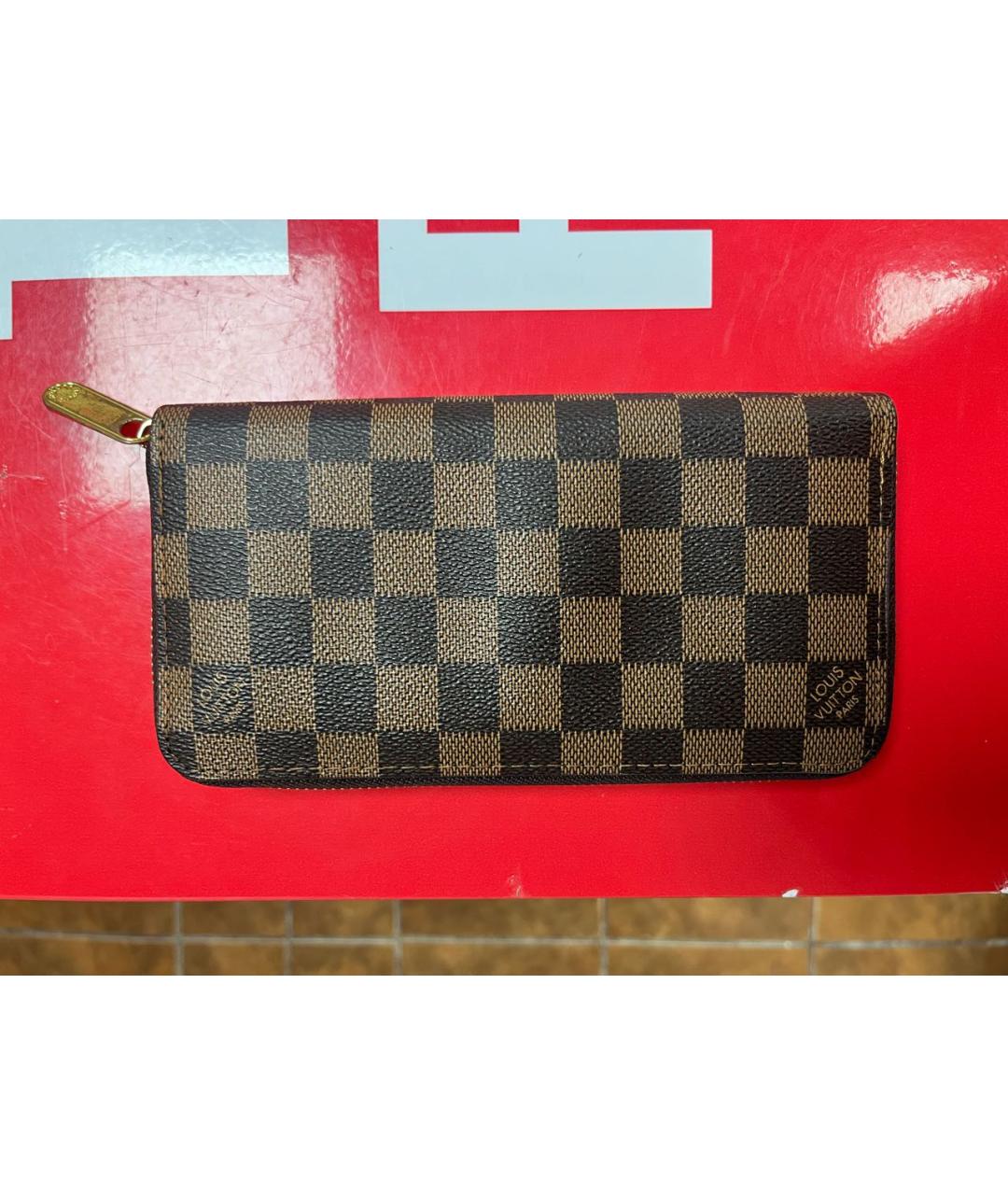 LOUIS VUITTON Коричневый кожаный кошелек, фото 2