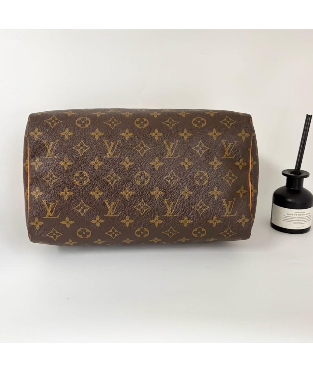 LOUIS VUITTON Коричневая кожаная сумка с короткими ручками, фото 4