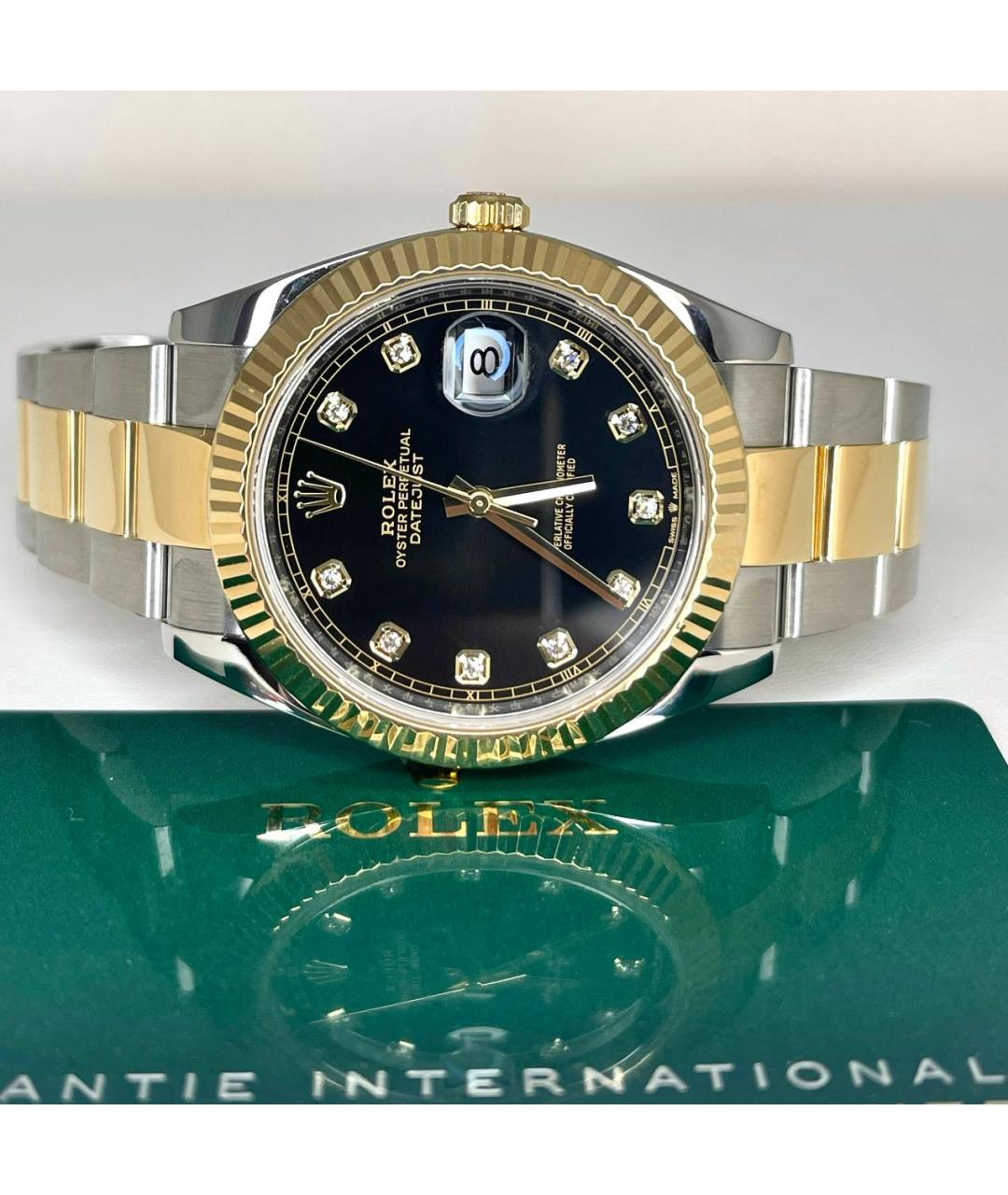 ROLEX Черные часы из желтого золота, фото 2