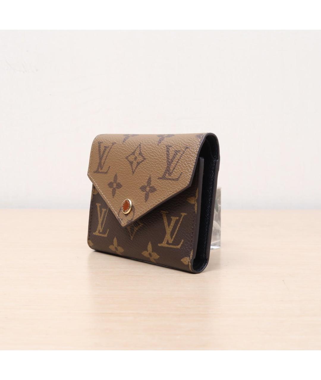 LOUIS VUITTON Коричневый кожаный кошелек, фото 4