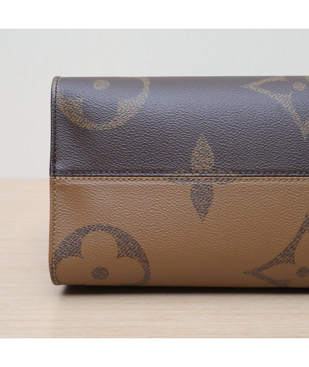LOUIS VUITTON Коричневая кожаная сумка через плечо, фото 9