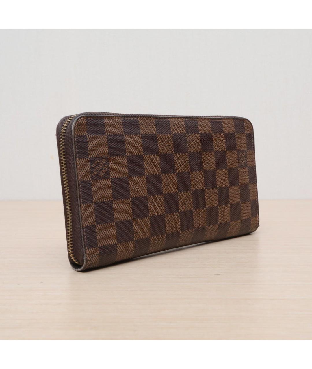 LOUIS VUITTON Коричневый кожаный кошелек, фото 6