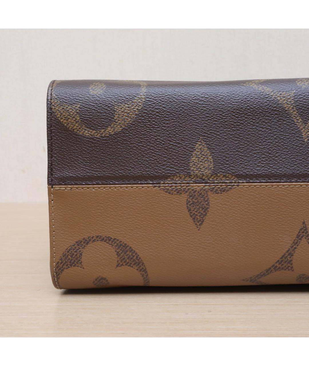 LOUIS VUITTON Коричневая кожаная сумка с короткими ручками, фото 9