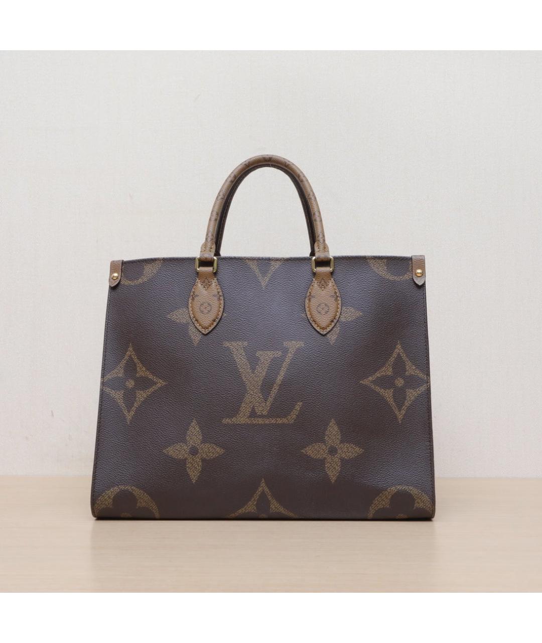 LOUIS VUITTON Коричневая кожаная сумка с короткими ручками, фото 3