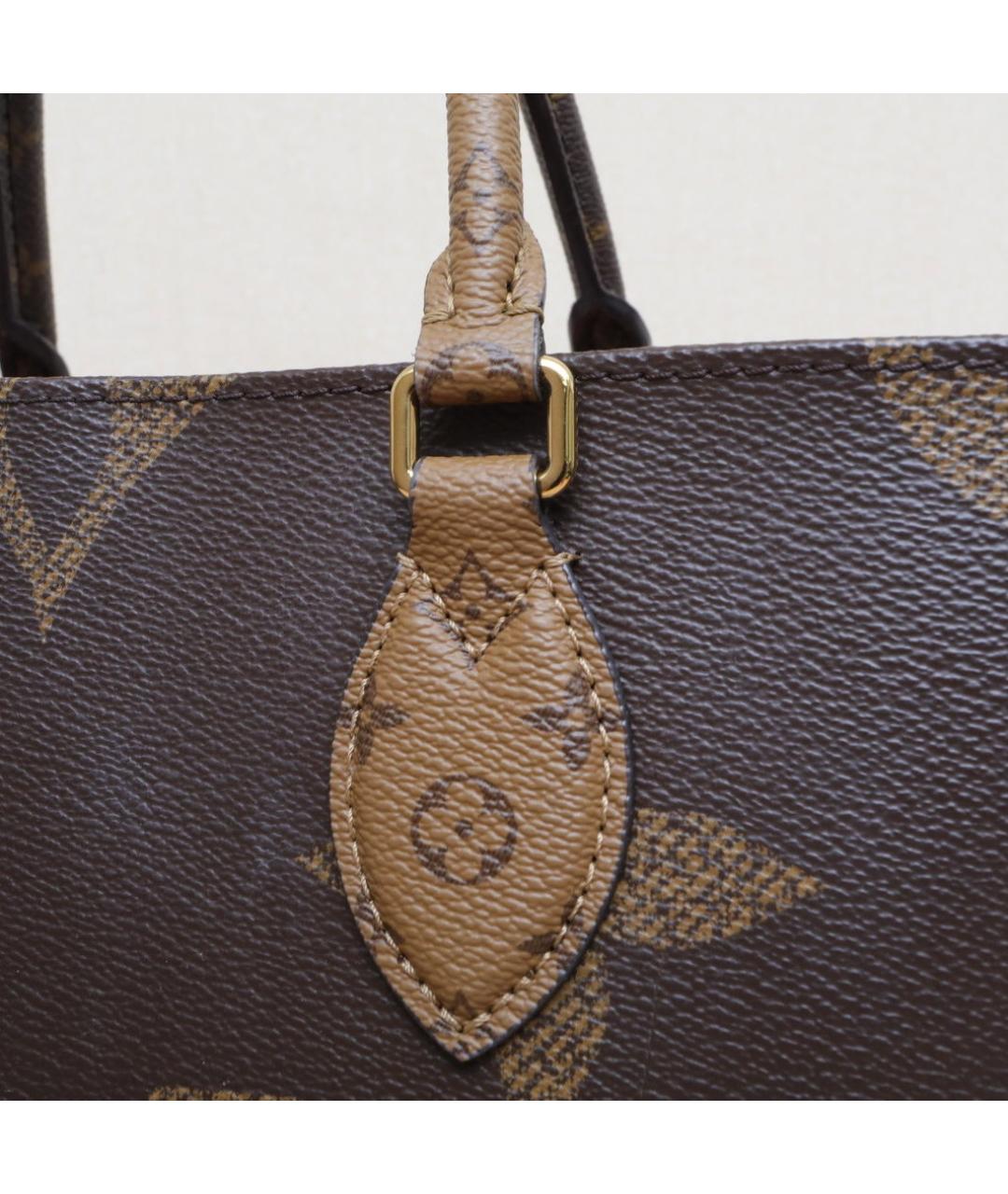 LOUIS VUITTON Коричневая кожаная сумка с короткими ручками, фото 8