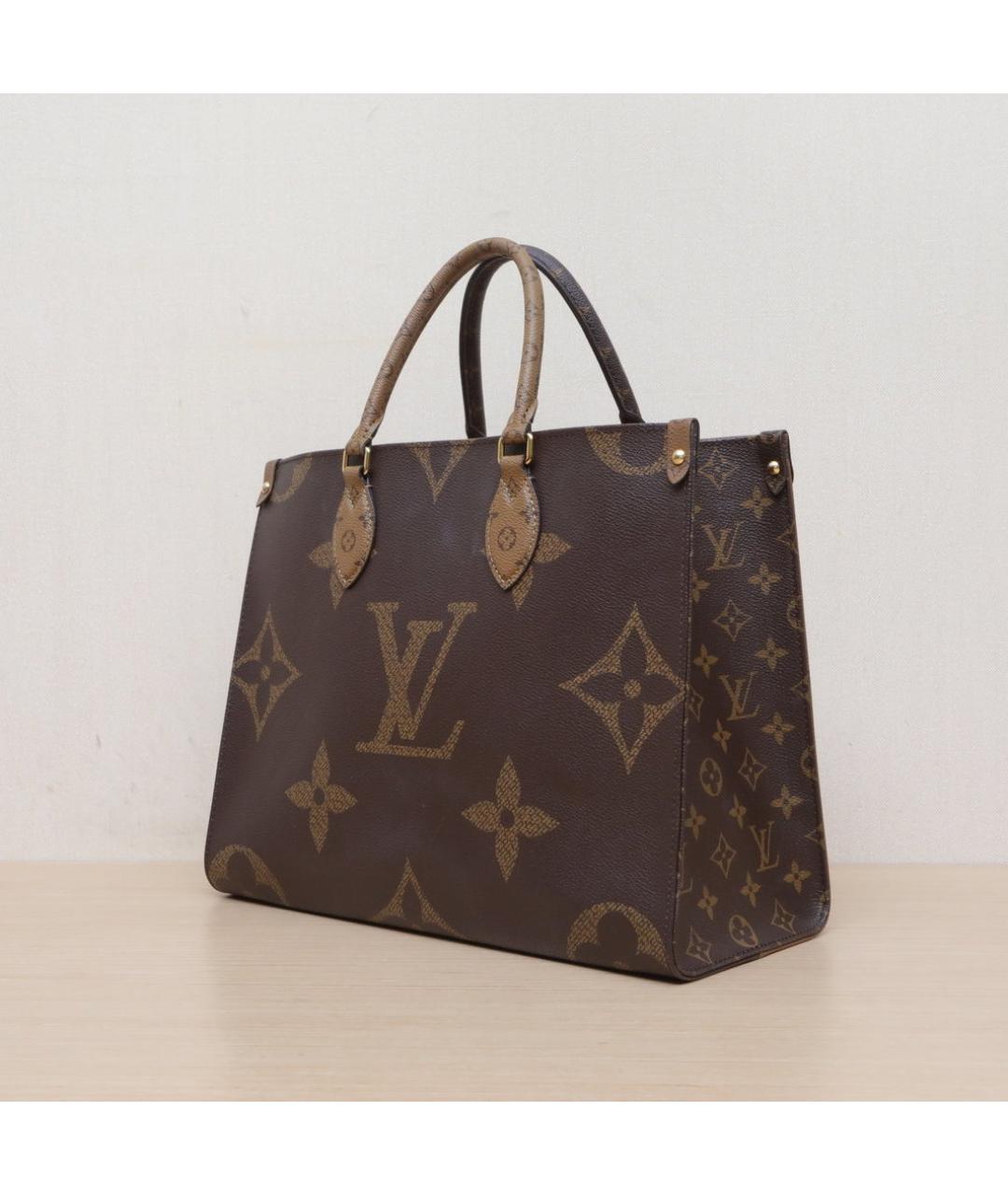 LOUIS VUITTON Коричневая кожаная сумка с короткими ручками, фото 4