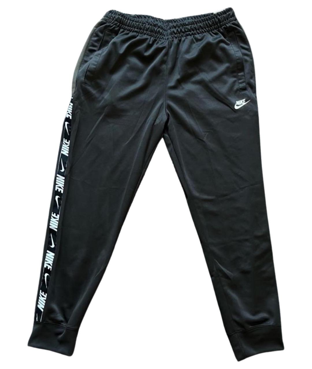 NIKE Полиэстеровые повседневные брюки, фото 1