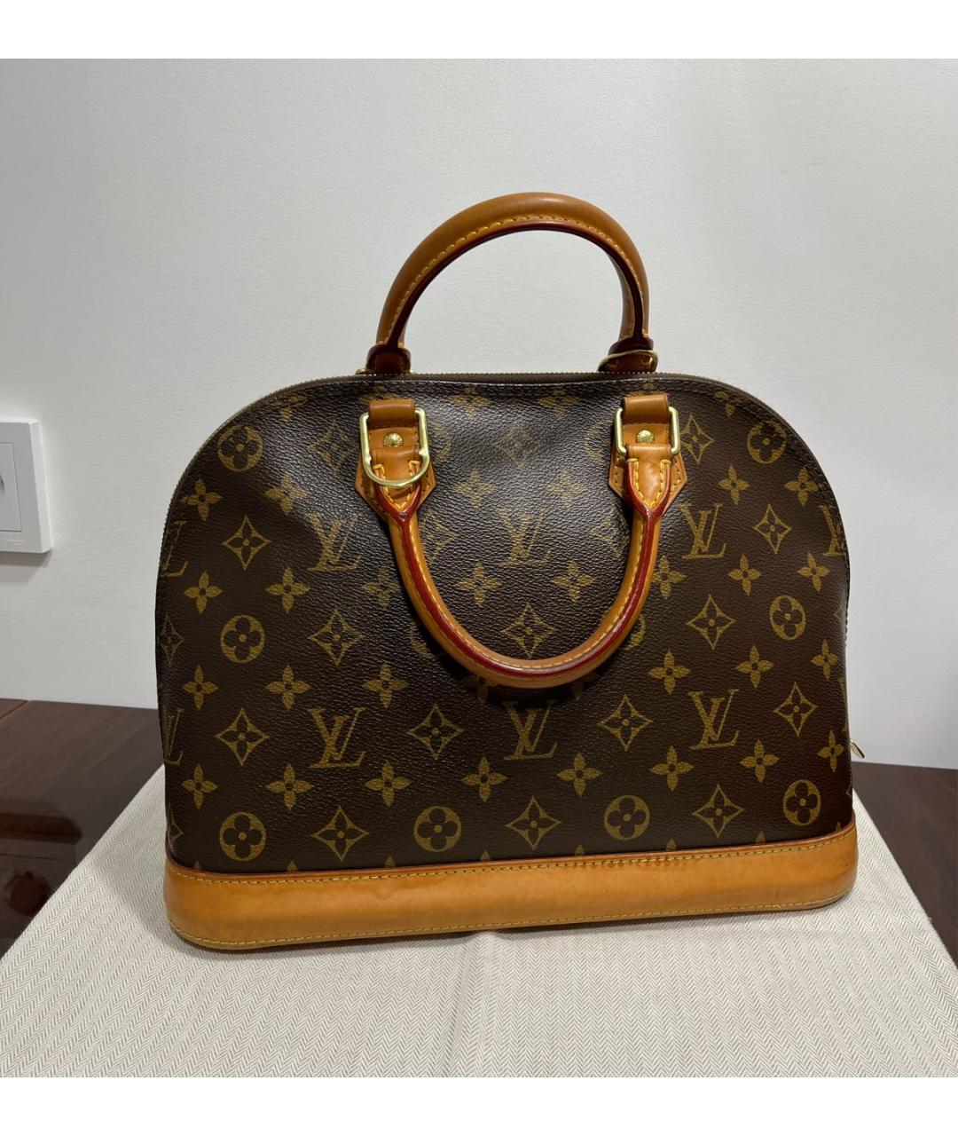 LOUIS VUITTON Коричневая кожаная сумка с короткими ручками, фото 5