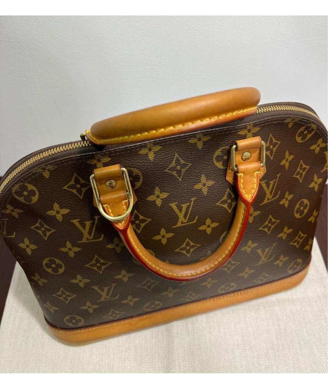 LOUIS VUITTON Коричневая кожаная сумка с короткими ручками, фото 4