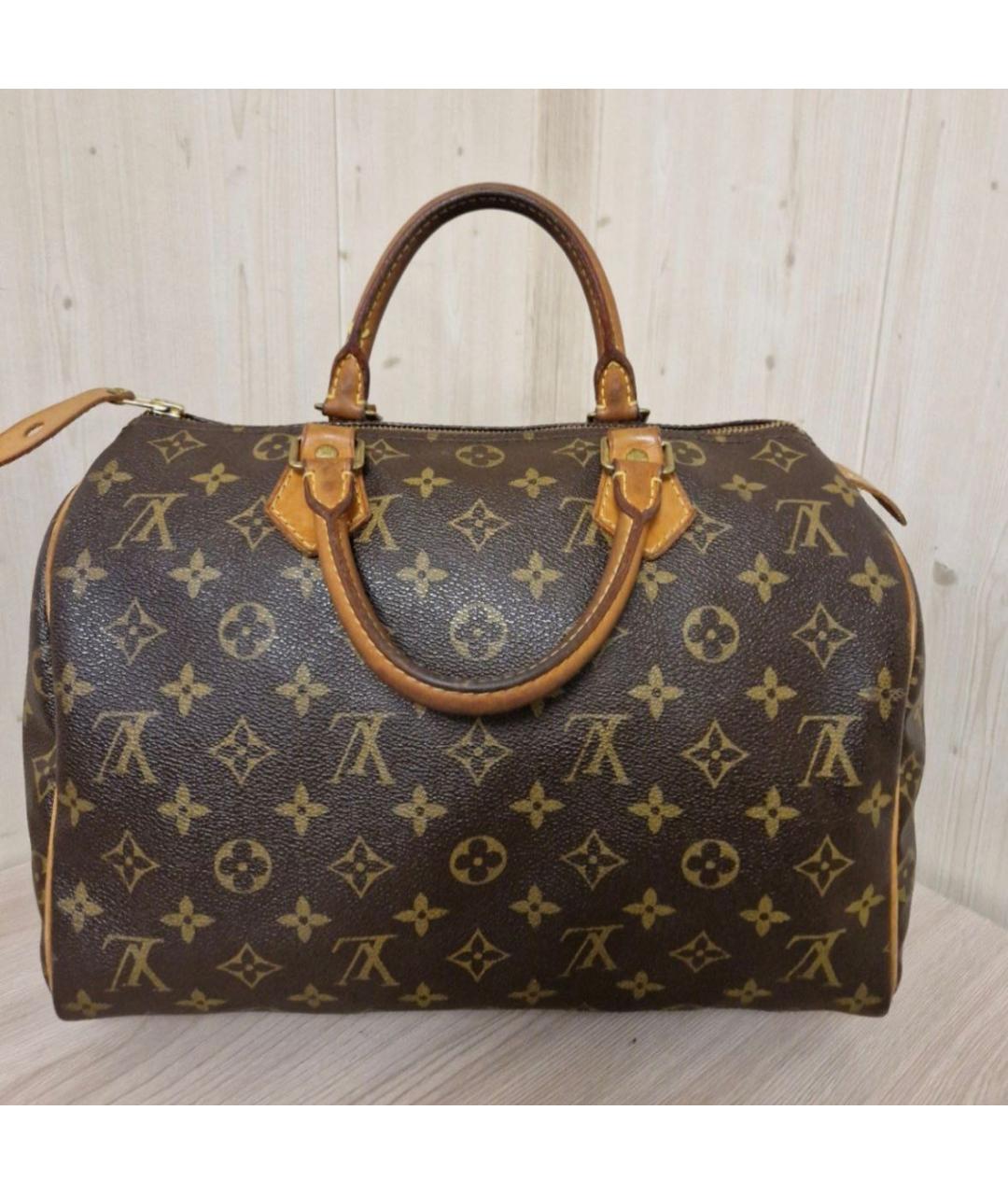 LOUIS VUITTON Коричневая кожаная сумка с короткими ручками, фото 9