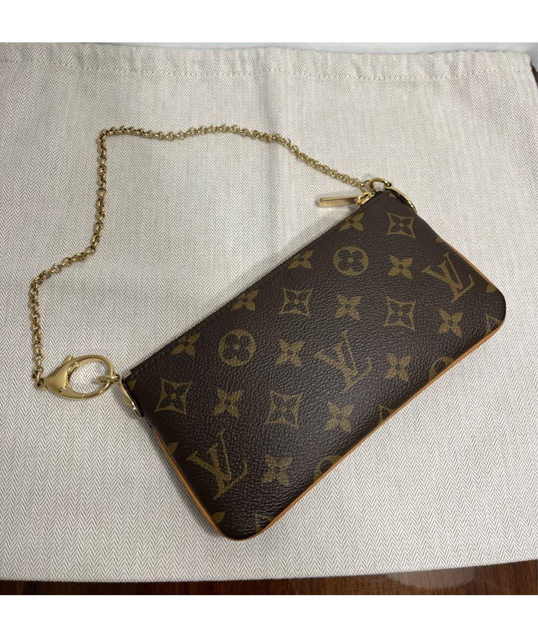 LOUIS VUITTON Коричневая кожаная сумка с короткими ручками, фото 6