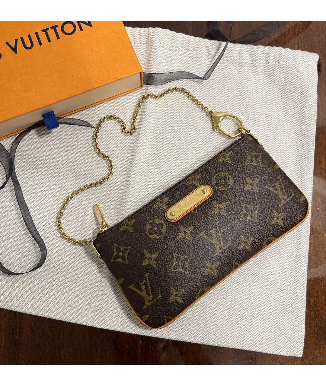 LOUIS VUITTON Коричневая кожаная сумка с короткими ручками, фото 5