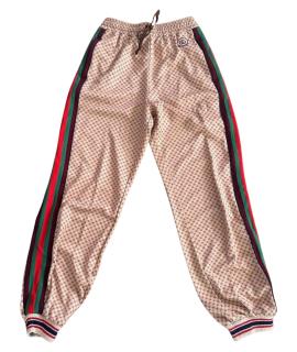 GUCCI Спортивные брюки и шорты
