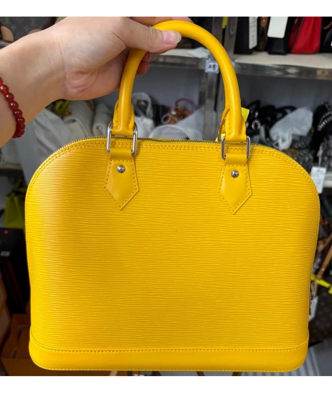 LOUIS VUITTON Желтая кожаная сумка с короткими ручками, фото 2