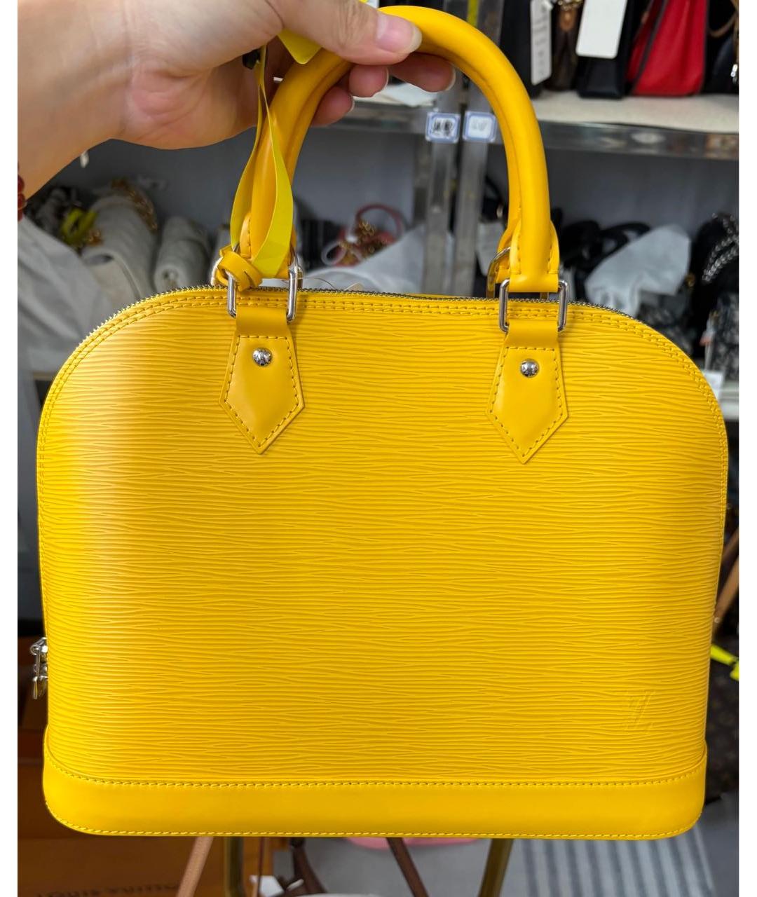 LOUIS VUITTON Желтая кожаная сумка с короткими ручками, фото 9