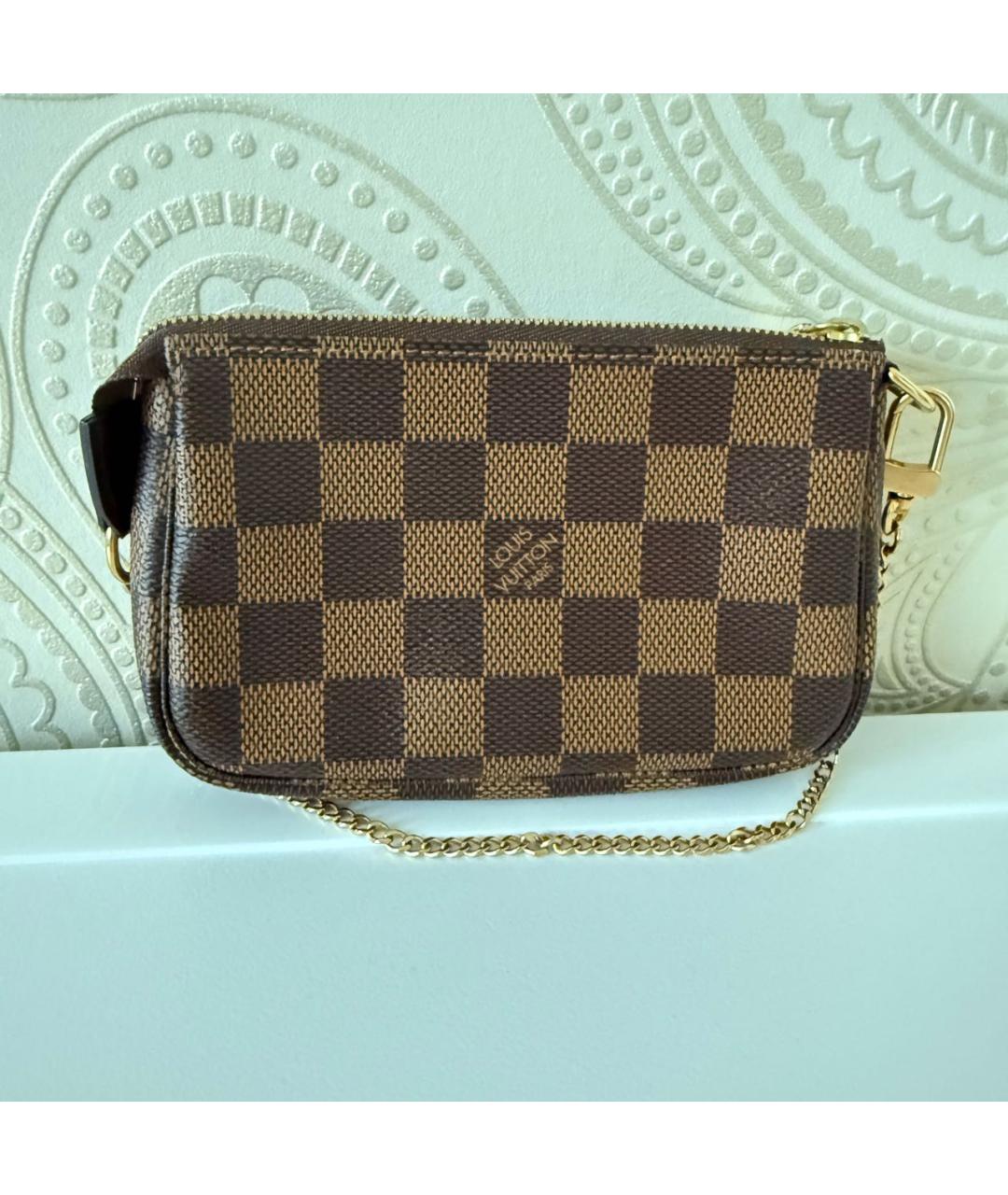 LOUIS VUITTON Коричневая кожаная сумка с короткими ручками, фото 3