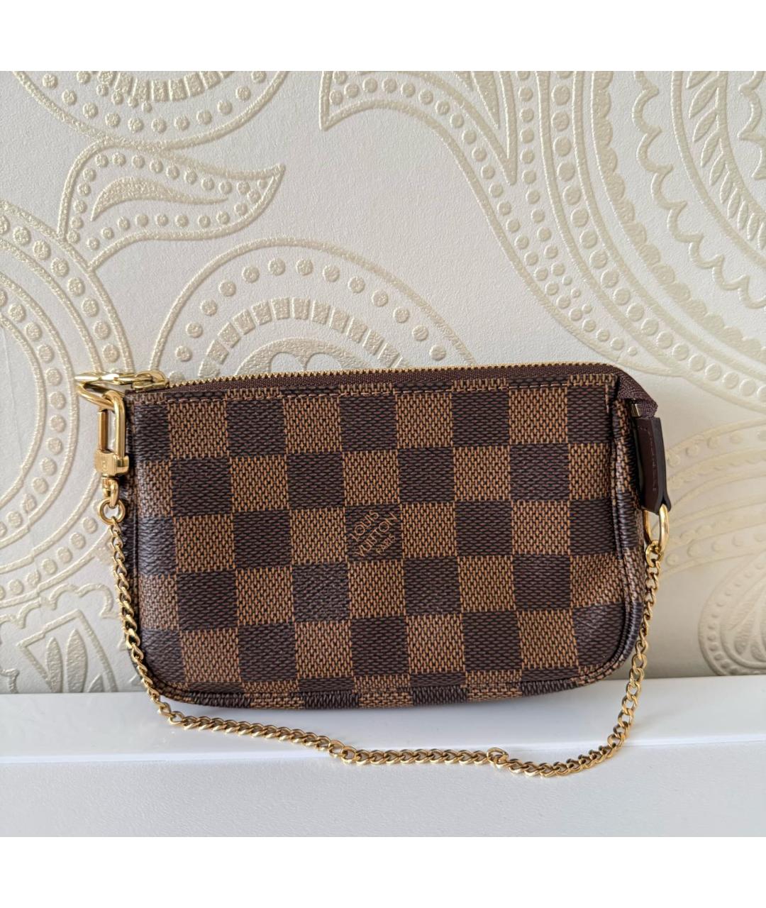 LOUIS VUITTON Коричневая кожаная сумка с короткими ручками, фото 9