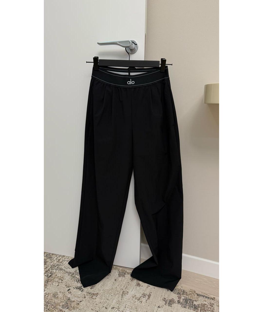 ALO YOGA Черные полиэстеровые брюки широкие, фото 7