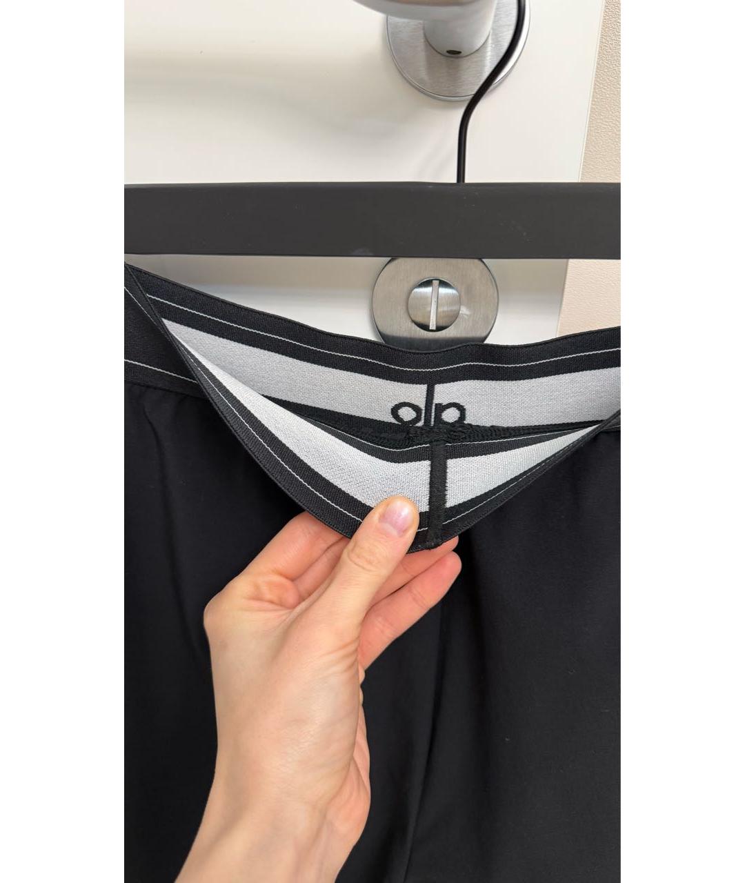 ALO YOGA Черные полиэстеровые брюки широкие, фото 4