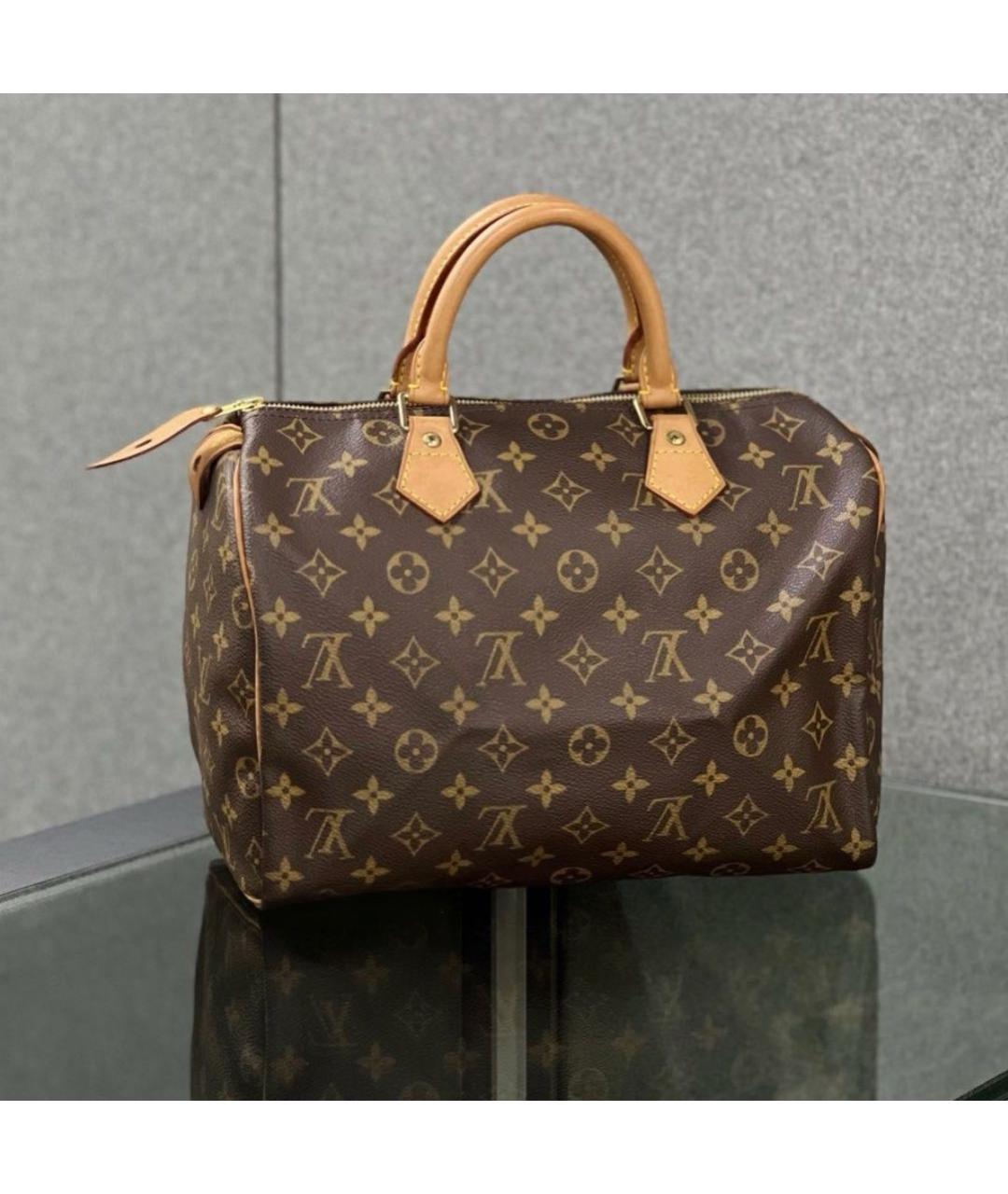 LOUIS VUITTON Коричневая кожаная сумка с короткими ручками, фото 4