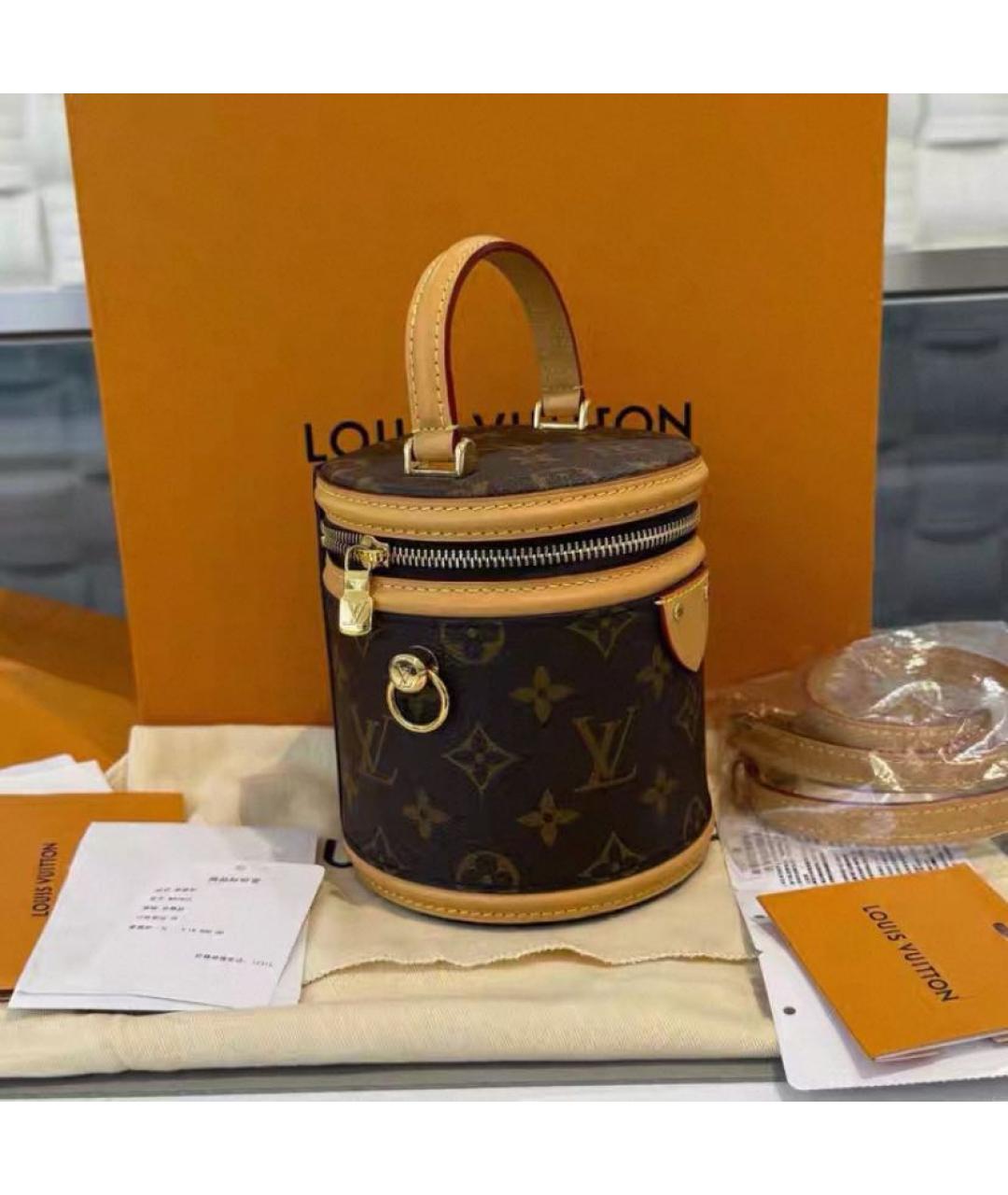 LOUIS VUITTON Коричневая кожаная сумка с короткими ручками, фото 3