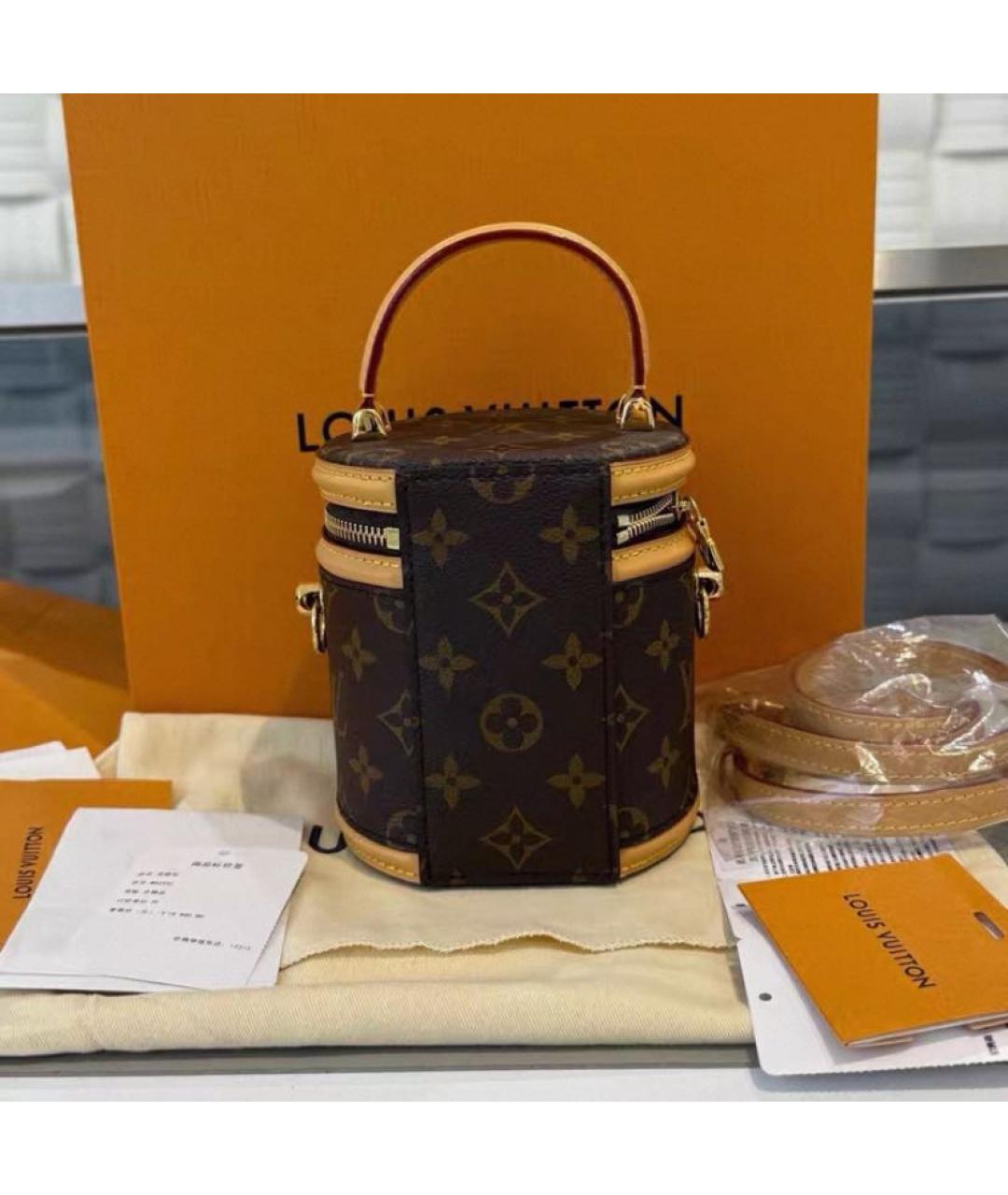 LOUIS VUITTON Коричневая кожаная сумка с короткими ручками, фото 4