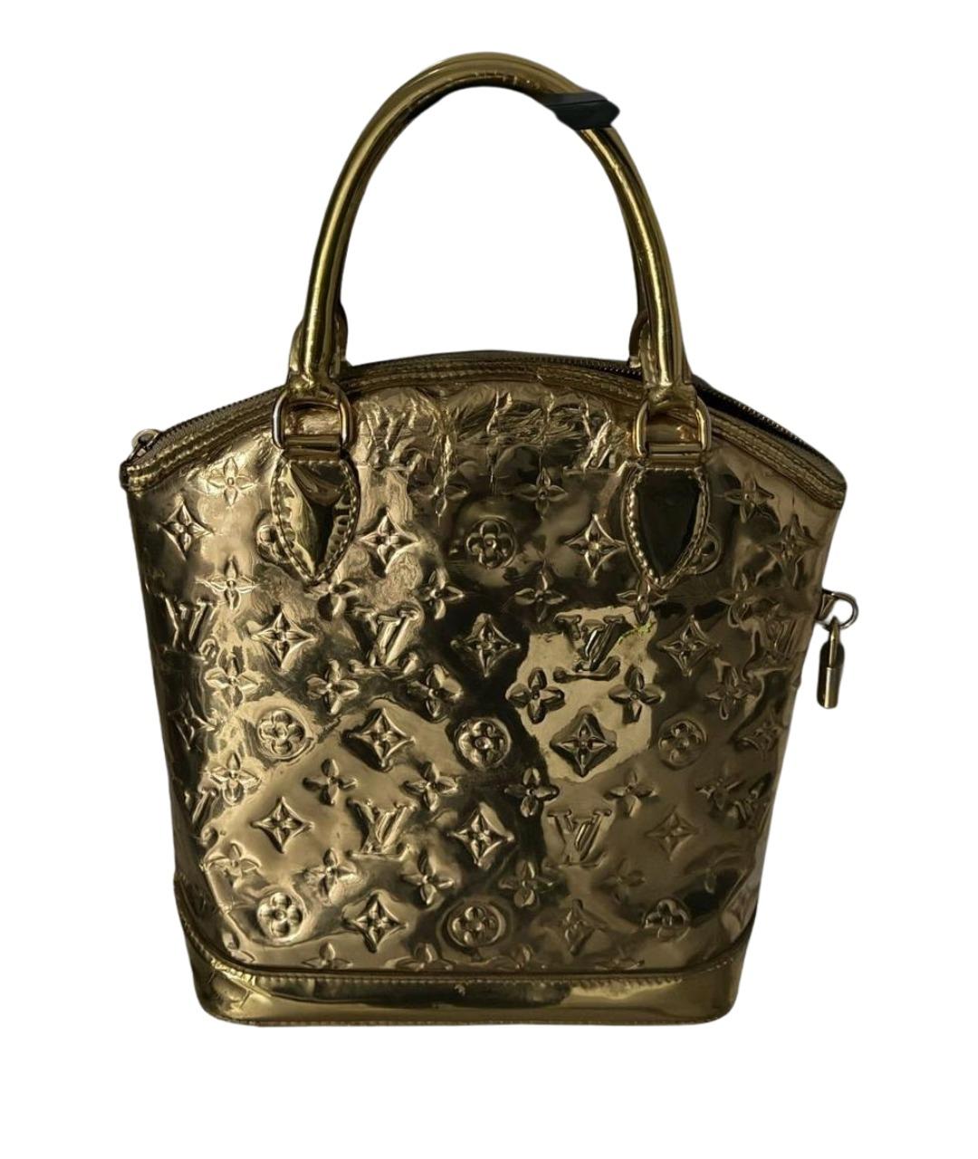 LOUIS VUITTON Золотая кожаная сумка с короткими ручками, фото 1