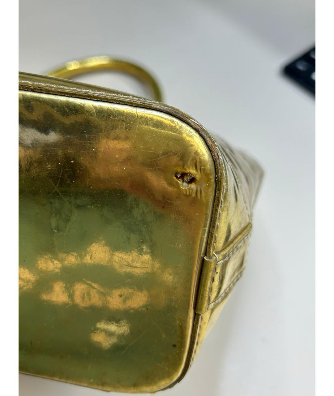 LOUIS VUITTON Золотая кожаная сумка с короткими ручками, фото 4