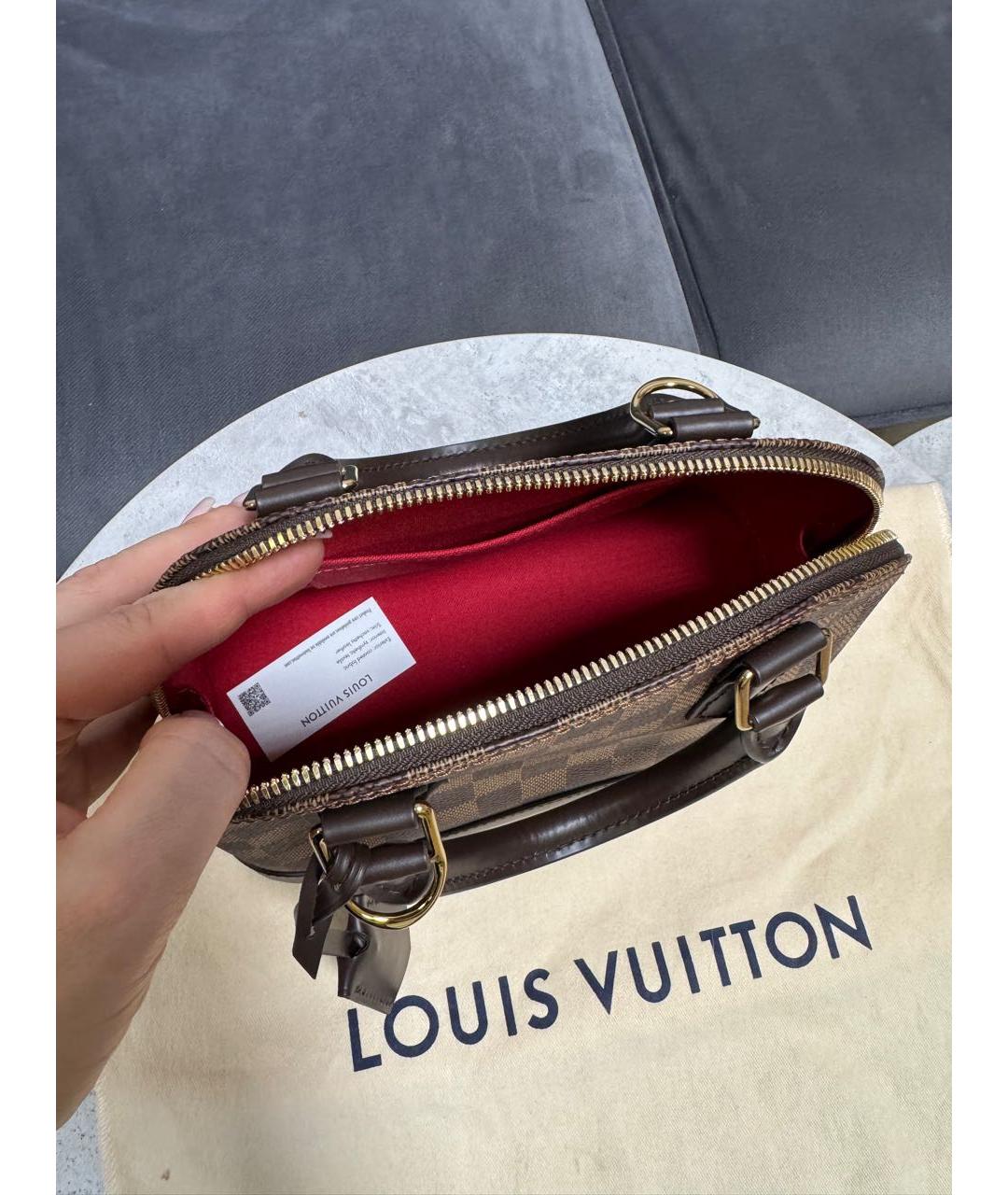 LOUIS VUITTON Коричневая кожаная сумка с короткими ручками, фото 5