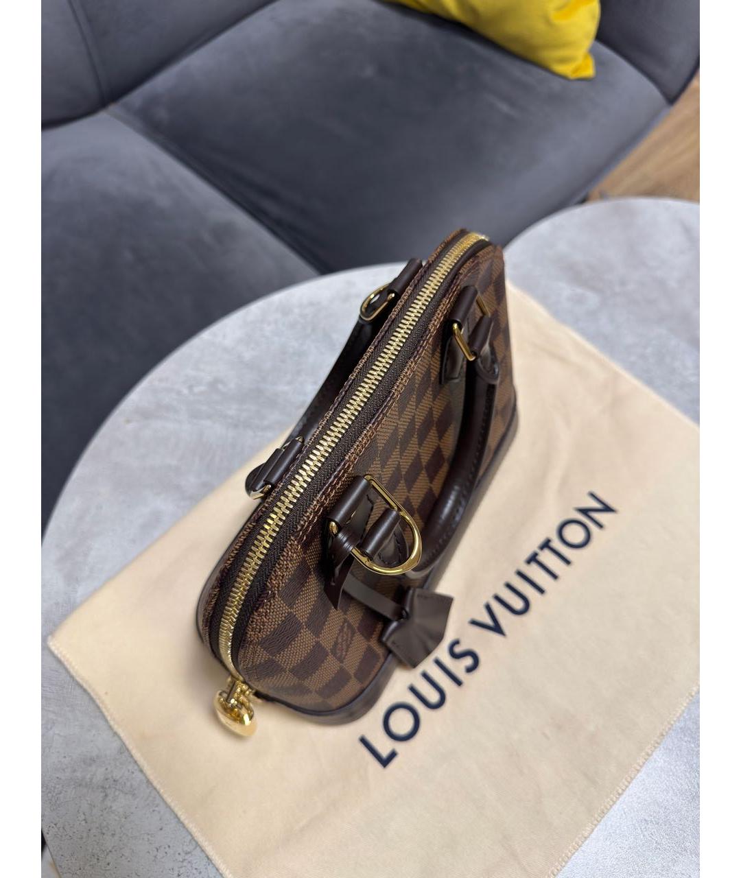 LOUIS VUITTON Коричневая кожаная сумка с короткими ручками, фото 4