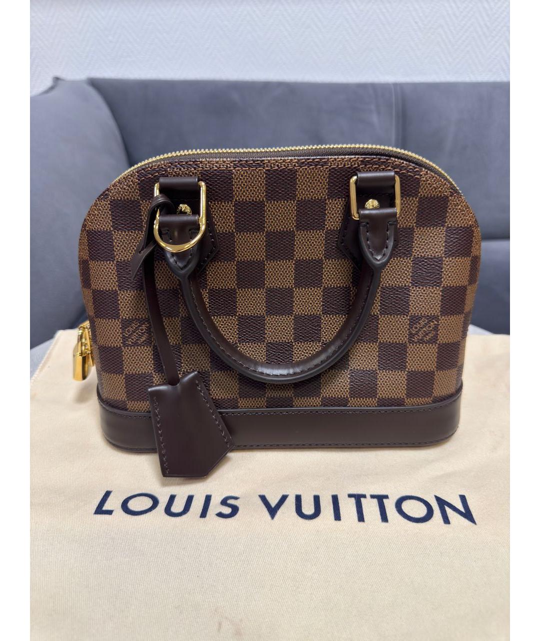 LOUIS VUITTON Коричневая кожаная сумка с короткими ручками, фото 8