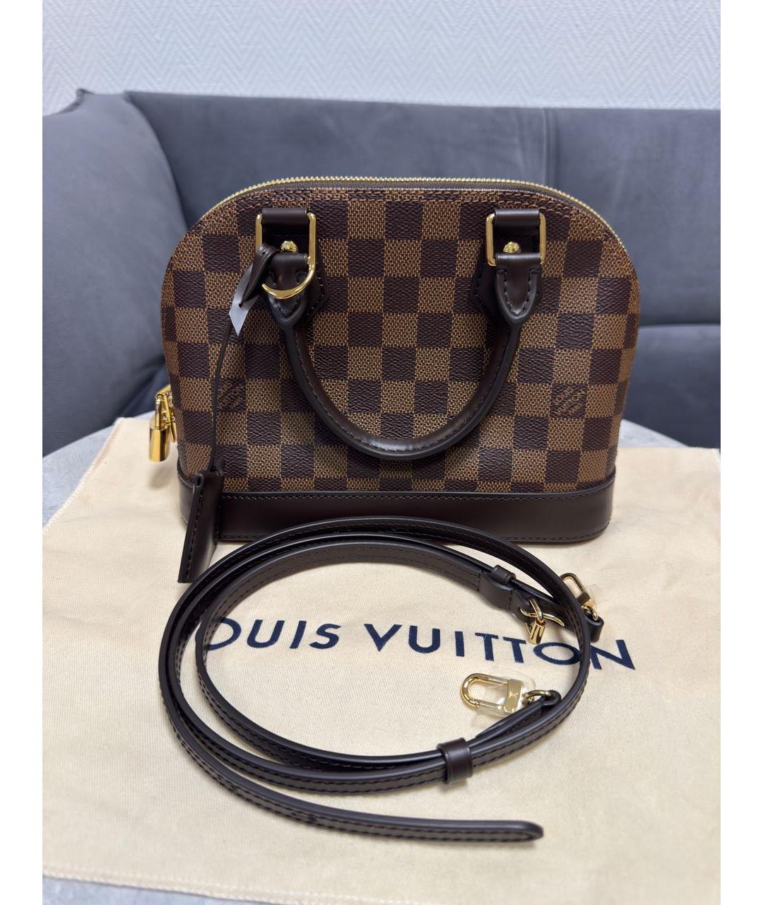 LOUIS VUITTON Коричневая кожаная сумка с короткими ручками, фото 6